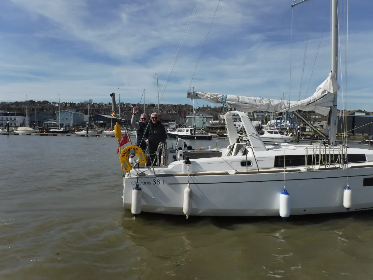 Learning to sail in the near the Cowes harbour entrance in the Solent