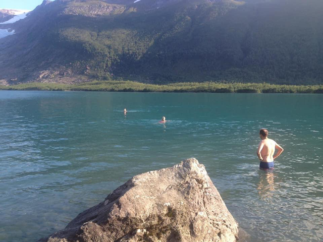 Santosa's Arctic Circle Swim Club Beside A Glacier