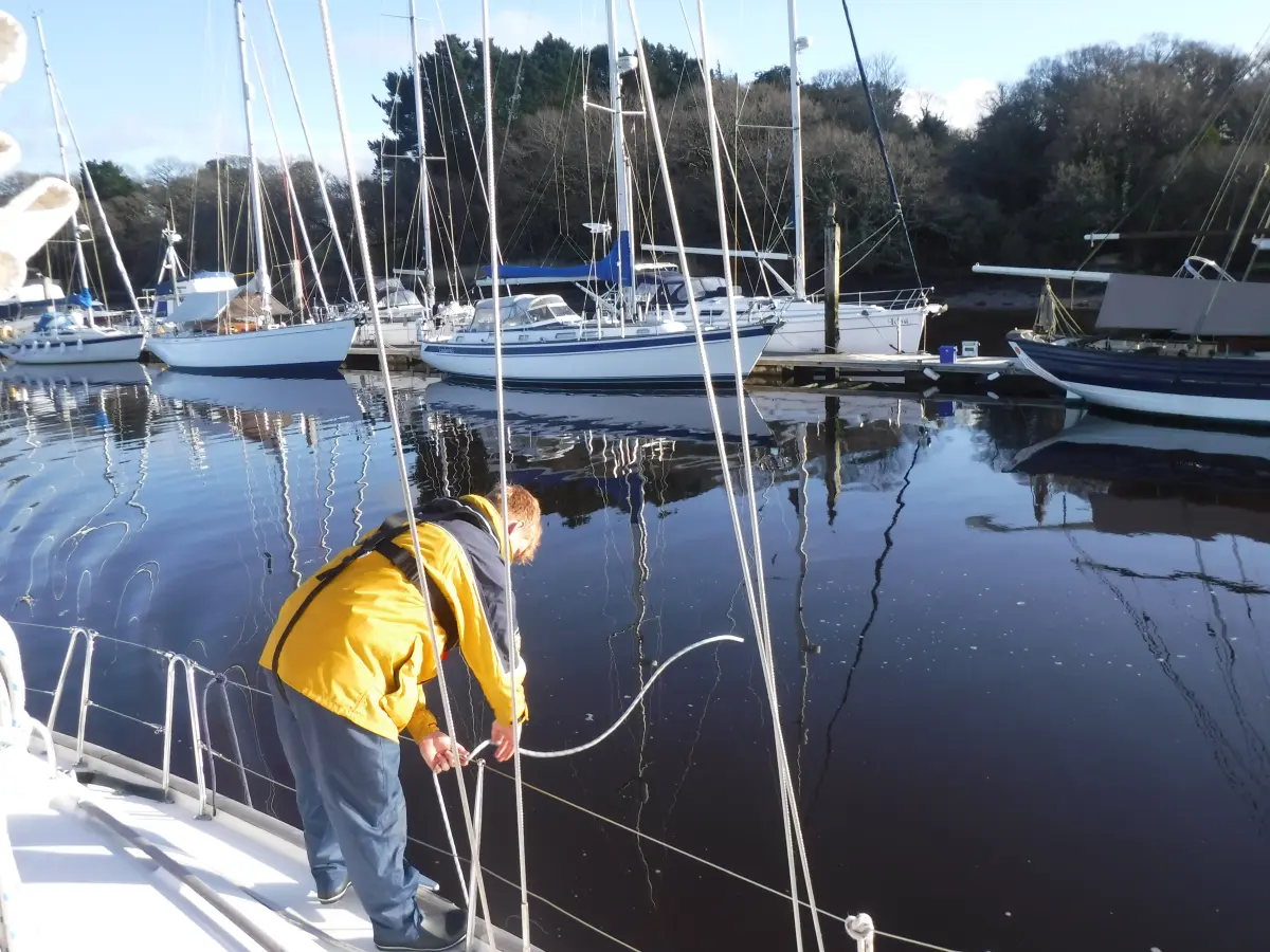 Yacht preparing to moor in the Beaulieu River