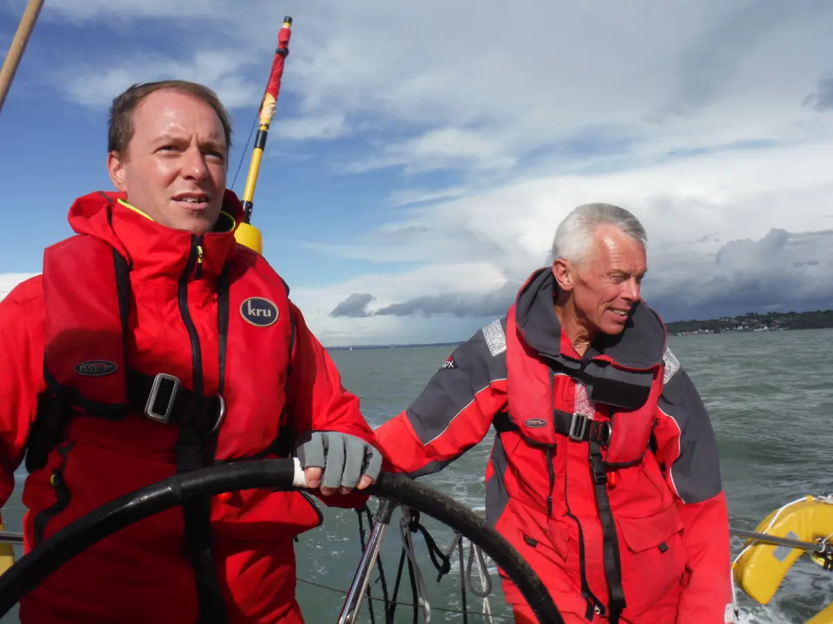 Learning to skipper a yacht during a Day Skipper course FAQs guide in the Solent