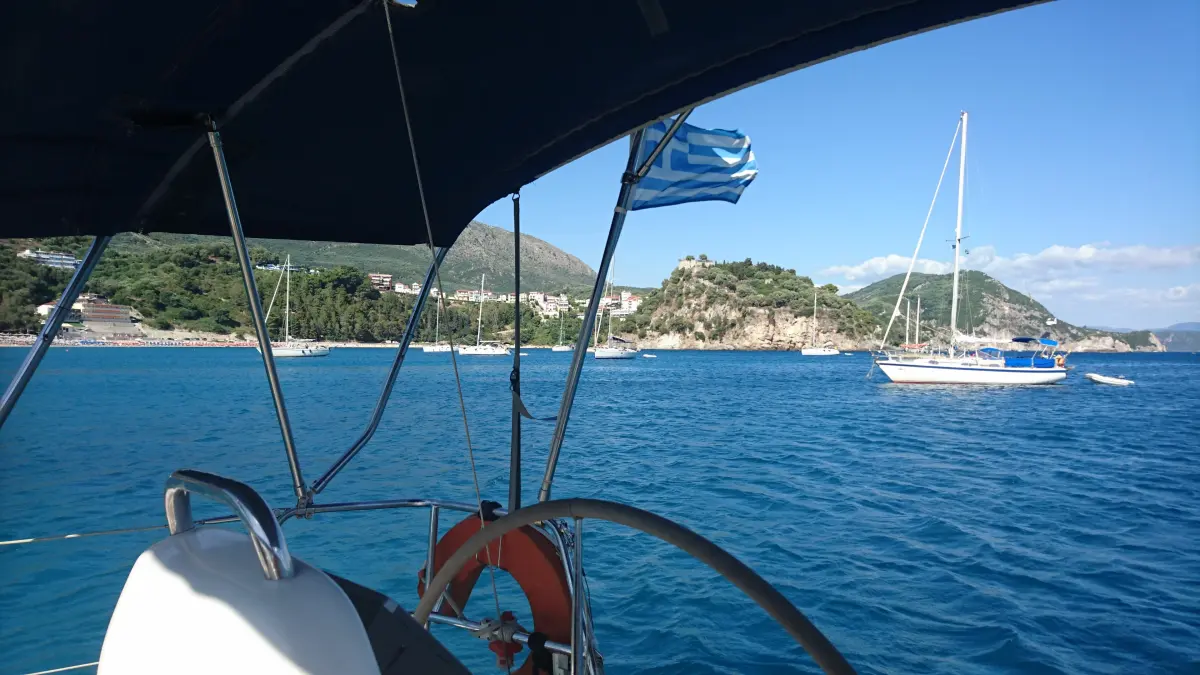 Skippering a yacht in calm waters after completing Day Skipper qualification