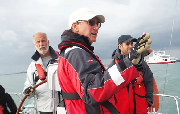 RYA Coastal Skipper instructor briefing crew on deck