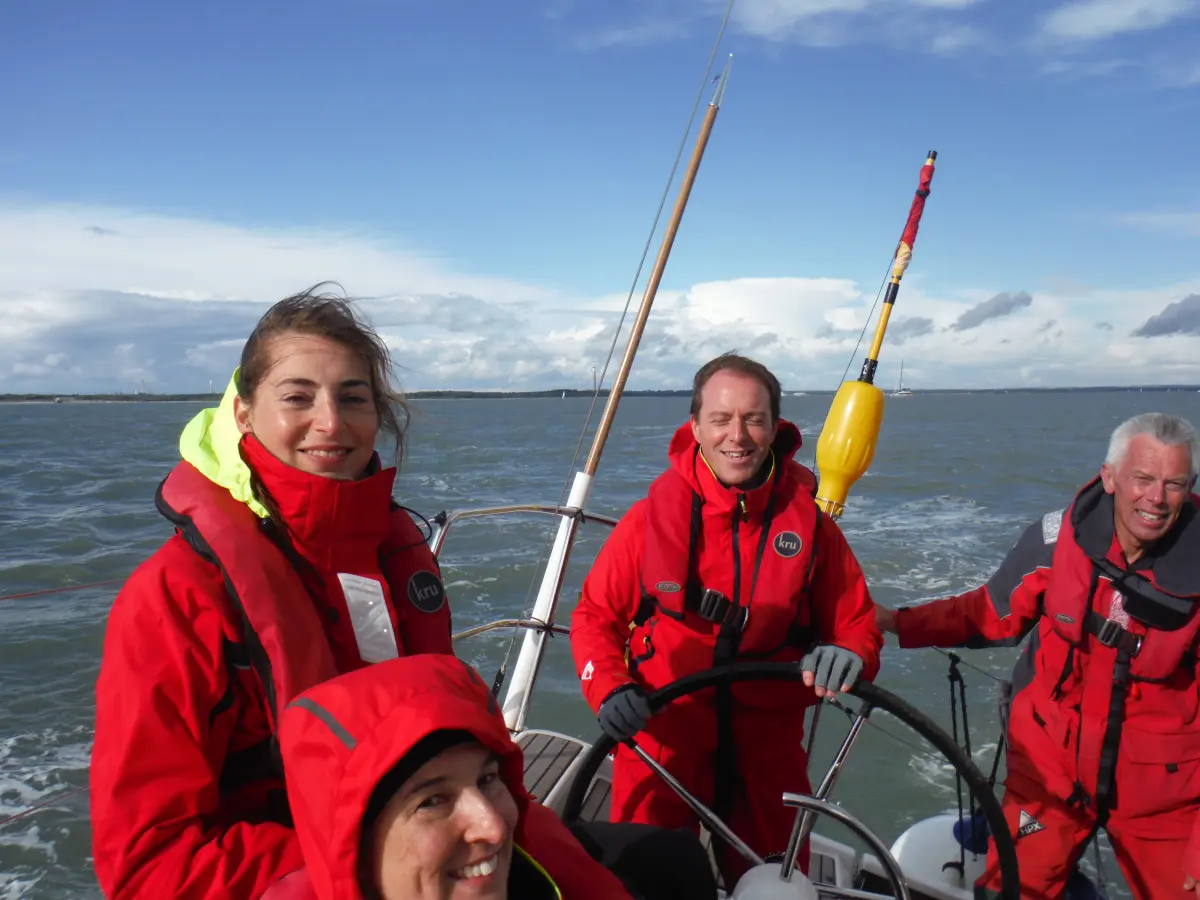 A yacht sailing in strong tidal waters in the Solent with visible current lines Yacht sailing in tidal waters in the Solent where tidal streams affect navigation