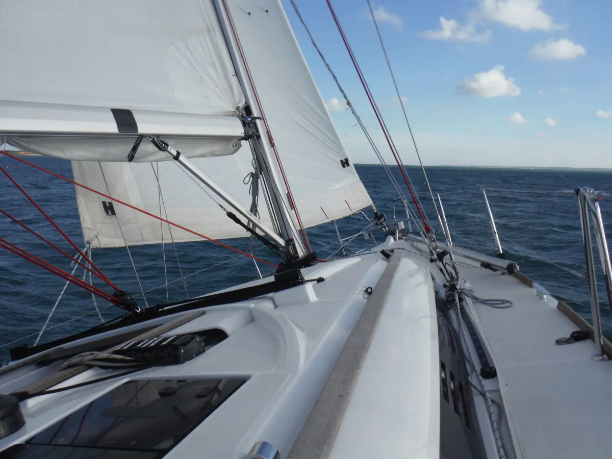 Training yacht heeling gently in the Solent breeze.