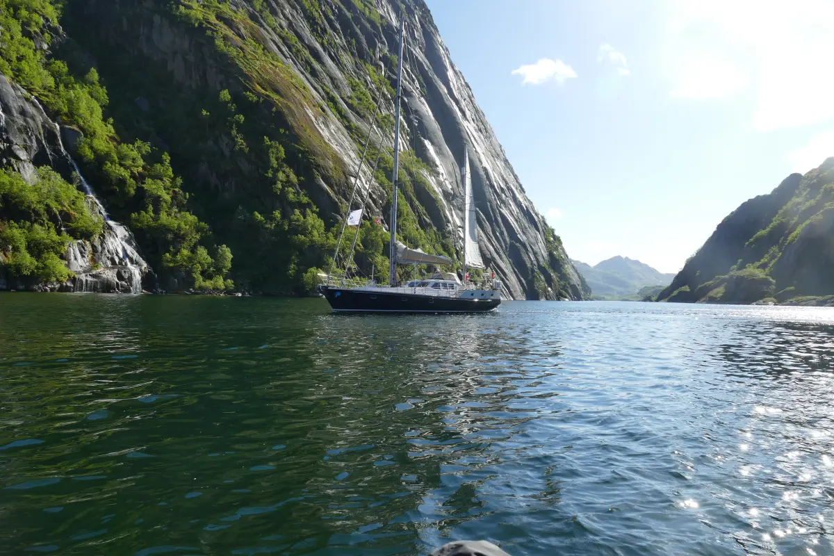 Hitchhiker’s Guide Norwegian fjords coastline with dramatic cliffs and sweeping curves