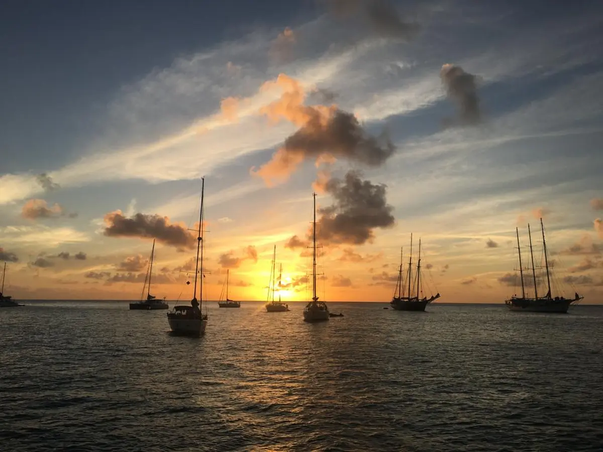 Caribbean sailing holiday anchorage at sunset