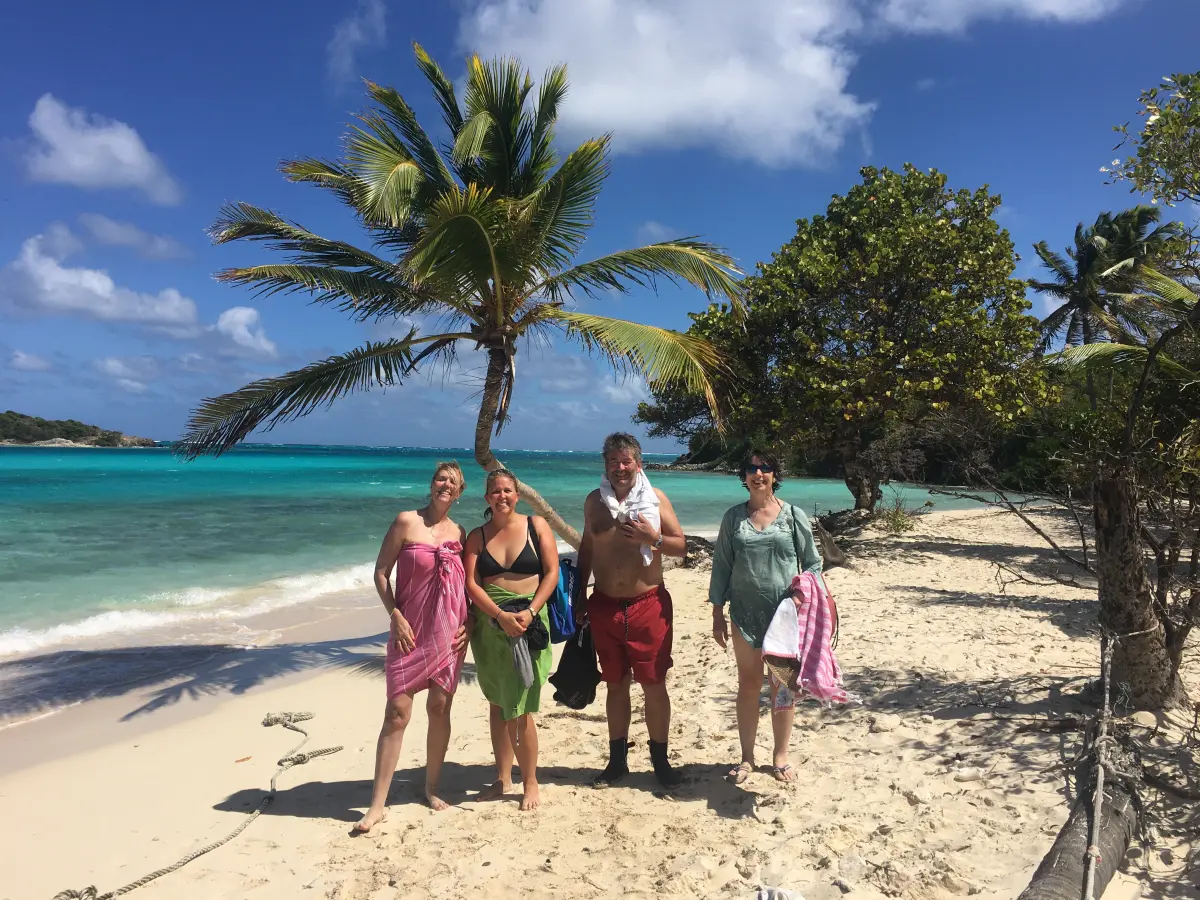Crew relaxing together on a trip ashore to the beach